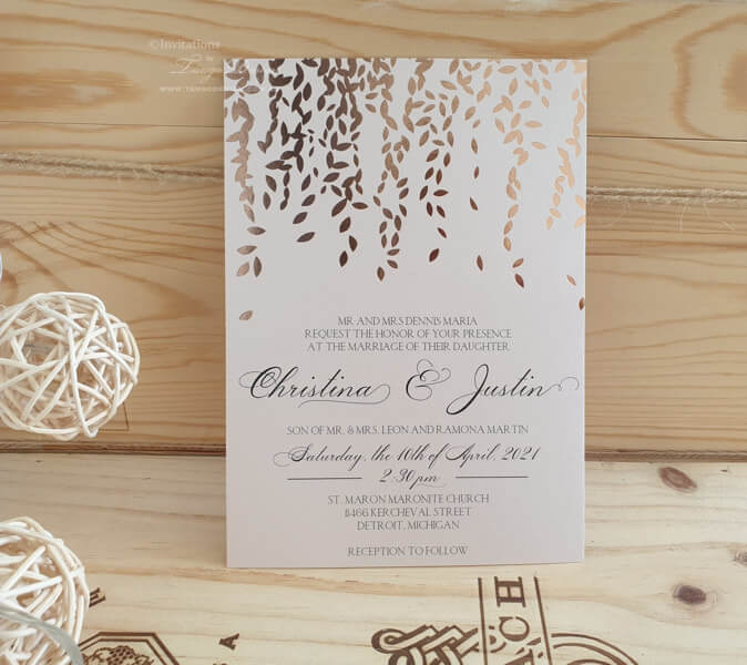 Rose gold wedding invitation with leaf design. Botanical, greenery or elegant rustic wedding theme.